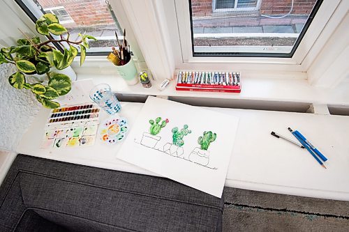 MIKE SUDOMA / WINNIPEG FREE PRESS  
Kirsten Neil, a former social media marketer, turned full time water colour artist, works on a personal piece titled Tiny Pots in her homes sunroom turned studio Friday afternoon
April 22, 2021
