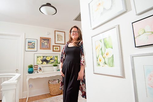 MIKE SUDOMA / WINNIPEG FREE PRESS  
Kirsten Neil, a former social media marketer, turned full time water colour artist, shows off her homes gallery space Friday afternoon April 22, 2021