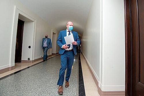 MIKE SUDOMA / WINNIPEG FREE PRESS  
Dr Brent Roussin makes his way to a press conference Friday evening where he later announced a stricter set of Covid 19 restrictions 
April 22, 2021