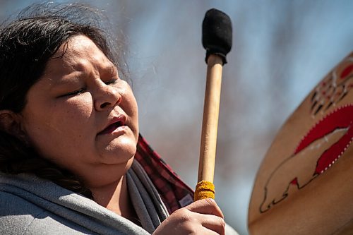 Daniel Crump / Winnipeg Free Press. Lynn Cook plays a drum and sings songs for her grandmothers, who were both murdered, and all missing and murdered indigenous women and girls. Cook was the only person who attended this Saturdays vigil near the Canadian Museum for Human Rights at the Forks. She insisted on drumming despite bruises and a broken arm she recently sustained during an assault. May 8, 2021.