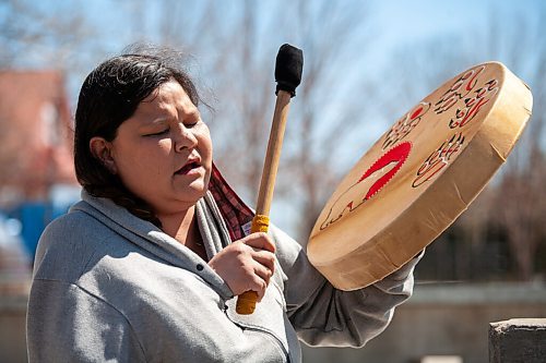 Daniel Crump / Winnipeg Free Press. Lynn Cook plays a drum and sings songs for her grandmothers, who were both murdered, and all missing and murdered indigenous women and girls. Cook was the only person who attended this Saturdays vigil near the Canadian Museum for Human Rights at the Forks. She insisted on drumming despite bruises and a broken arm she recently sustained during an assault. May 8, 2021.