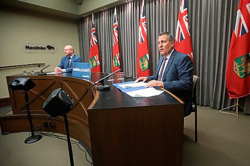 JOHN WOODS / WINNIPEG FREE PRESS
Manitoba Education Minister Cliff Cullen, right, and Dr. Brent Roussin, chief provincial public health officer speak at a COVID-19 press conference at the Manitoba Legislature in Winnipeg Sunday, May 9, 2021. Additional COVID-19 measures for schools including closures were announced.

Reporter: Durrani