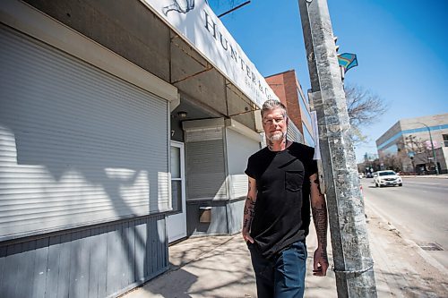 MIKAELA MACKENZIE / WINNIPEG FREE PRESS

Jeremy Regan, owner of Hunter & Gunn, poses for a portrait in front of the shuttered barbershop in Winnipeg on Monday, May 10, 2021. For Temur story.
Winnipeg Free Press 2020.