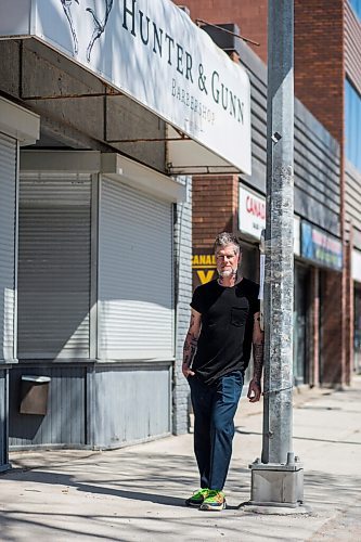 MIKAELA MACKENZIE / WINNIPEG FREE PRESS

Jeremy Regan, owner of Hunter & Gunn, poses for a portrait in front of the shuttered barbershop in Winnipeg on Monday, May 10, 2021. For Temur story.
Winnipeg Free Press 2020.