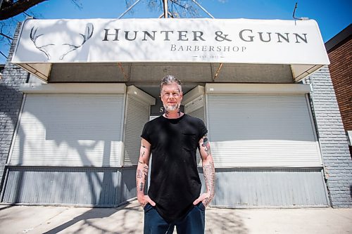 MIKAELA MACKENZIE / WINNIPEG FREE PRESS

Jeremy Regan, owner of Hunter & Gunn, poses for a portrait in front of the shuttered barbershop in Winnipeg on Monday, May 10, 2021. For Temur story.
Winnipeg Free Press 2020.