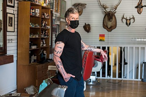 MIKAELA MACKENZIE / WINNIPEG FREE PRESS

Jeremy Regan, owner of Hunter & Gunn, poses for a portrait in front of the shuttered barbershop in Winnipeg on Monday, May 10, 2021. For Temur story.
Winnipeg Free Press 2020.