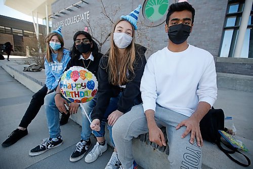 JOHN WOODS / WINNIPEG FREE PRESS
Maples Collegiate students Jamie Anderson, Isaac Nimmagadda, Rebecca Cabral and Harshveer Multani are photographed outside the school on Jefferson in Winnipeg Monday, May 10, 2021. Cabral was celebrating her 17th birthday with her friends on the Monday before COVID lockdown.

Reporter: Abas