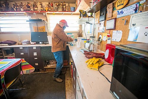 MIKAELA MACKENZIE / WINNIPEG FREE PRESS

Roger Stearns prepares formula for the cub at the black bear rehabilitation centre near Stonewall on Sunday, April 25, 2021. For Eva Wasney story.
Winnipeg Free Press 2020.