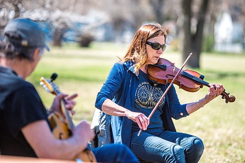 MIKAELA MACKENZIE / WINNIPEG FREE PRESS

Wayne Drury and Mary-Ann Fast play Celtic music in Harrow Park in Winnipeg on Tuesday, May 11, 2021. The group has been playing outside throughout the pandemic whenever weather allows. Standup.
Winnipeg Free Press 2020.