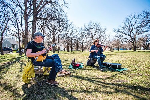 MIKAELA MACKENZIE / WINNIPEG FREE PRESS

Wayne Drury and Mary-Ann Fast play Celtic music in Harrow Park in Winnipeg on Tuesday, May 11, 2021. The group has been playing outside throughout the pandemic whenever weather allows. Standup.
Winnipeg Free Press 2020.