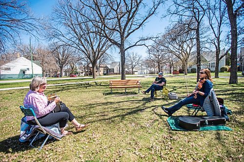 MIKAELA MACKENZIE / WINNIPEG FREE PRESS

Johanna Handford (left), Wayne Drury, and Mary-Ann Fast play Celtic music in Harrow Park in Winnipeg on Tuesday, May 11, 2021. The group has been playing outside throughout the pandemic whenever weather allows. Standup.
Winnipeg Free Press 2020.