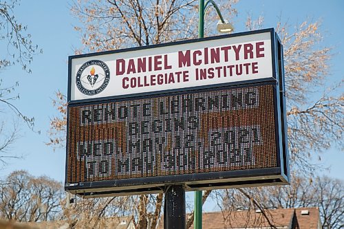 MIKE DEAL / WINNIPEG FREE PRESS
Sign announcing the return to remote learning at Daniel McIntyre Collegiate Institute (720 Alverstone St.) in the West End on what might end up being the last day of school for the year if the pandemic numbers get worse in Manitoba.
See Maggie Macintosh story
210511 - Tuesday, May 11, 2021.