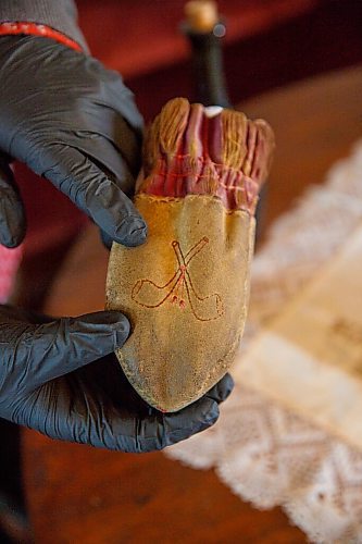 MIKE DEAL / WINNIPEG FREE PRESS
A leather tobacco pouch that belonged to Colin Inkster.
Eric Napier Strong, curator and manager of the Seven Oaks House Museum (50 Mac Street) during a behind the scenes look at some of the rarely seen artifacts in Winnipeg's oldest home turned museum.
See Brenda Suderman story
210511 - Tuesday, May 11, 2021.