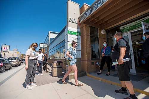 MIKAELA MACKENZIE / WINNIPEG FREE PRESS

Sisters Sophie (left) and Anica Warkentine walk in to get vaccinated at the Ma Mawi Wi Chi Itata Centre walk-in clinic on the day that eligibility expanded to include all Manitobans over the age of 18 in Winnipeg on Wednesday, May 12, 2021. For Malak story.
Winnipeg Free Press 2020.