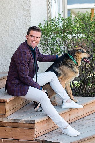 MIKAELA MACKENZIE / WINNIPEG FREE PRESS

Johanu Botha, co-lead of Manitoba's vaccine implementation task force, poses for a portrait with his dog, Gandalf, at his home in Winnipeg on Thursday, May 13, 2021. For Dylan story.
Winnipeg Free Press 2020.