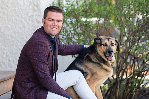 MIKAELA MACKENZIE / WINNIPEG FREE PRESS

Johanu Botha, co-lead of Manitoba's vaccine implementation task force, poses for a portrait with his dog, Gandalf, at his home in Winnipeg on Thursday, May 13, 2021. For Dylan story.
Winnipeg Free Press 2020.