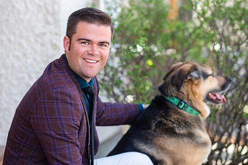 MIKAELA MACKENZIE / WINNIPEG FREE PRESS

Johanu Botha, co-lead of Manitoba's vaccine implementation task force, poses for a portrait with his dog, Gandalf, at his home in Winnipeg on Thursday, May 13, 2021. For Dylan story.
Winnipeg Free Press 2020.