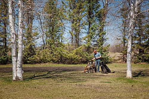 MIKE DEAL / WINNIPEG FREE PRESS
Yury Harczan a professional dog trainer who trained Anita Hart's service dog. Yury lives on six acres and has his own pack of dogs.
See Sabrina Carnevale story
210513 - Thursday, May 13, 2021.