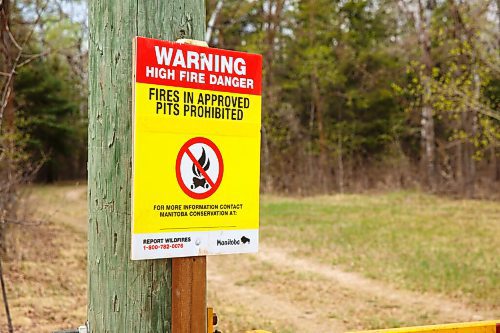 MIKE DEAL / WINNIPEG FREE PRESS
An access road into Birds Hill Provincial Park off of Hwy 206 with a sign that says, "Fires in approved pits prohibited". 
The most recent restrictions announced by the province on May 13th include prohibitions on campfires and that camping is only allowed in developed campgrounds, so, no backcountry or wild camping.
210514 - Friday, May 14, 2021.