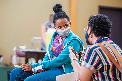 MIKAELA MACKENZIE / WINNIPEG FREE PRESS

Merhawit Teklebihan speaks to the Free Press after getting her COVID-19 vaccine at a pop-up community vaccine clinic at Knox United Church in Winnipeg on Friday, May 14, 2021. For JS story.
Winnipeg Free Press 2020.