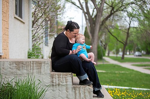 MIKAELA MACKENZIE / WINNIPEG FREE PRESS

Megan Collison poses for a portrait with her baby, Calvin, at her home in Winnipeg on Wednesday, May 19, 2021.  Megan Collison lost her mother to COVID at the start of the pandemic, right before she had a chance to tell her she was a grandma. For Jen Zoratti story.
Winnipeg Free Press 2020.