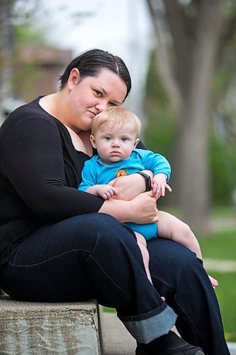 MIKAELA MACKENZIE / WINNIPEG FREE PRESS

Megan Collison poses for a portrait with her baby, Calvin, at her home in Winnipeg on Wednesday, May 19, 2021.  Megan Collison lost her mother to COVID at the start of the pandemic, right before she had a chance to tell her she was a grandma. For Jen Zoratti story.
Winnipeg Free Press 2020.