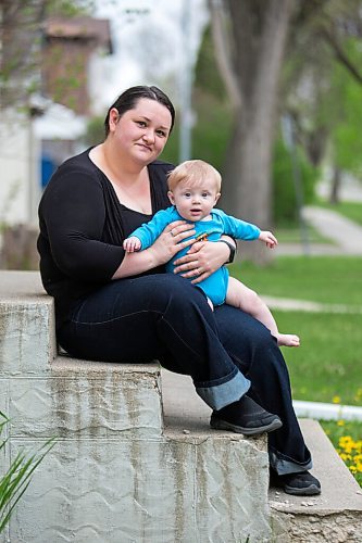 MIKAELA MACKENZIE / WINNIPEG FREE PRESS

Megan Collison poses for a portrait with her baby, Calvin, at her home in Winnipeg on Wednesday, May 19, 2021.  Megan Collison lost her mother to COVID at the start of the pandemic, right before she had a chance to tell her she was a grandma. For Jen Zoratti story.
Winnipeg Free Press 2020.