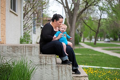 MIKAELA MACKENZIE / WINNIPEG FREE PRESS

Megan Collison poses for a portrait with her baby, Calvin, at her home in Winnipeg on Wednesday, May 19, 2021.  Megan Collison lost her mother to COVID at the start of the pandemic, right before she had a chance to tell her she was a grandma. For Jen Zoratti story.
Winnipeg Free Press 2020.