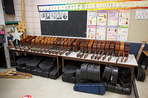 MIKE DEAL / WINNIPEG FREE PRESS
Guitars are lined up on a table in the music room at R. F. Morrison School.
See Maggie Macintosh story
210519 - Wednesday, May 19, 2021.