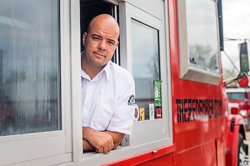 MIKAELA MACKENZIE / WINNIPEG FREE PRESS

Red Ember owner Steffen Zinn poses for a portrait with his food truck, currently parked in storage, in Oak Bluff on Wednesday, May 19, 2021. City councillor Shawn Nason is urging the city to offer 10% rebates on food truck permits, stating fewer are being applied for during the pandemic, and Zinn said hes not sure a rebate would be enough. For Joyanne Pursaga story.
Winnipeg Free Press 2020.