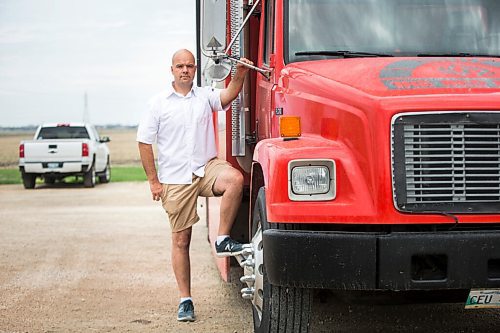 MIKAELA MACKENZIE / WINNIPEG FREE PRESS

Red Ember owner Steffen Zinn poses for a portrait with his food truck, currently parked in storage, in Oak Bluff on Wednesday, May 19, 2021. City councillor Shawn Nason is urging the city to offer 10% rebates on food truck permits, stating fewer are being applied for during the pandemic, and Zinn said hes not sure a rebate would be enough. For Joyanne Pursaga story.
Winnipeg Free Press 2020.