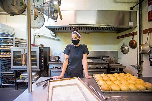 MIKAELA MACKENZIE / WINNIPEG FREE PRESS

Carter Bouchard, owner of Salt and Sunshine Bagels (a specialty bagel bakery she started on Instagram during the pandemic), poses for a portrait in her rented kitchen space at the Irish Association in Winnipeg on Thursday, May 20, 2021.  For Eva Wasney story.
Winnipeg Free Press 2020.