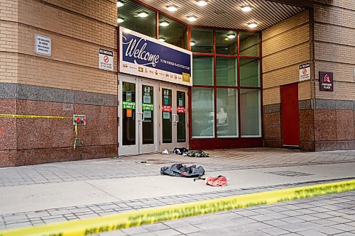 MIKE SUDOMA / WINNIPEG FREE PRESS  
Piles of clothes and blood line the entrance to the Portage Place Foodcourt Friday morning
May 21, 2021
