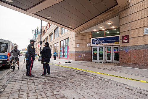 MIKE SUDOMA / WINNIPEG FREE PRESS  
Winnipeg Police Service respond to a scene in front of the entrance to the Portage Place Foodcourt Friday
May 21, 2021