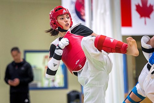 MIKAELA MACKENZIE / WINNIPEG FREE PRESS

Taekwondo athlete Skylar Park trains with her dad and brothers at TRP Academy of Martial Arts in Winnipeg on Friday, May 21, 2021. For Mike Sawatzky story.
Winnipeg Free Press 2020.