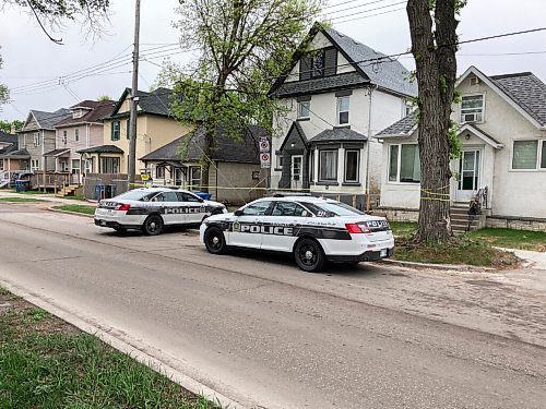 Winnipeg police at the scene of a homicide in the 300 block of Burrows Avenue on the morning of May 21, 2021. The body of Trevor Clayton Dorion, 33, was found the previous afternoon. (Adam Treusch / Winnipeg Free Press)