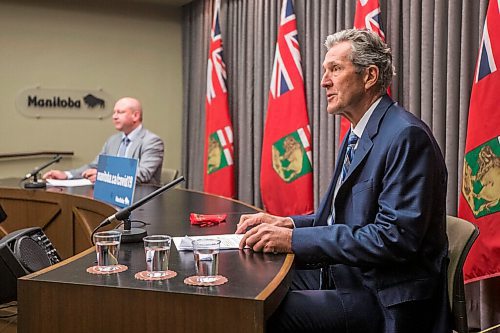 MIKAELA MACKENZIE / WINNIPEG FREE PRESS

Premier Brian Pallister (right) and chief public health officer Dr. Brent Roussin announce new restrictions at the Manitoba Legislative Building in Winnipeg on Thursday, May 27, 2021. For Larry Kusch story.
Winnipeg Free Press 2020.