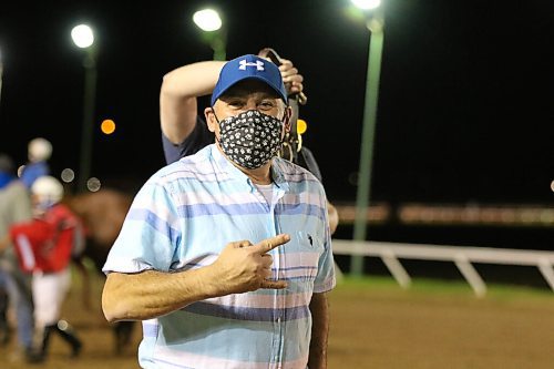 George Williams / Winnipeg Free Press
2020 Leading Trainer Jerry Gourneau smiles through his mask after winning the 7th race on Monday with Lil Miss Zak.