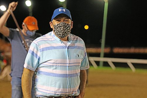 George Williams / Winnipeg Free Press
2020 Leading Trainer Jerry Gourneau smiles through his mask after winning the 7th race on Monday with Lil Miss Zak.