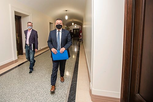 MIKAELA MACKENZIE / WINNIPEG FREE PRESS

Education minister Cliff Cullen walks in to announce school COVID-19 funding for 2021-22 at the Manitoba Legislative Building in Winnipeg on Thursday, May 27, 2021. For Maggie Macintosh story.
Winnipeg Free Press 2020.