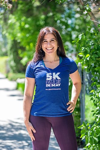 MIKAELA MACKENZIE / WINNIPEG FREE PRESS

Maria Cefali, who is currently doing a month-long fundraiser called 5K Every Day in May, poses for a portrait in her running gear in Winnipeg on Friday, May 28, 2021. She volunteers her time with Sleep in Heavenly Peace Winnipeg, and is aiming to raise $5,000 for the organization with her running fundraiser. For Aaron Epp story.
Winnipeg Free Press 2020.