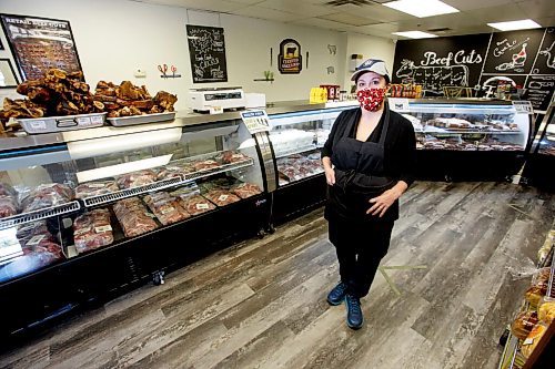 MIKE DEAL / WINNIPEG FREE PRESS
Michelle Bailey at Boulevard Meats and Deli in Southdale (49 Vermillion Road) Friday morning getting the shop read for opening.
51-year-old Michelle Bailey never thought she'd leave the well-paying jobs in corporate communications that she worked at for most of her life. But after her last contract ended, Bailey struggled to land any stable work in the field because of the COVID-19 pandemic, despite her nearly three decades of experience. She's now pivoted to a job at a local deli, something she's received a fair bit of side-eyes and taunts for from her friends and extended family. But Bailey is proud of how she's been able to put food on the table and pay her bills with this job.
See Temur Durrani story
210528 - Friday, May 28, 2021.