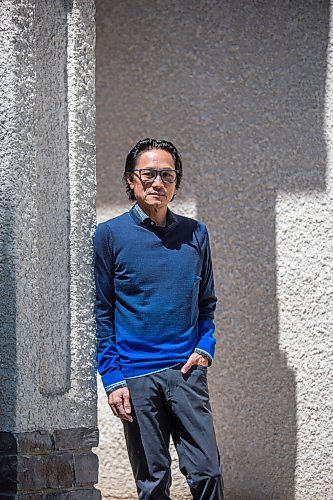 MIKAELA MACKENZIE / WINNIPEG FREE PRESS

Dr. Anthony Battad, who is speaking out about the inequality of the pandemic, poses for a portrait in front of his home in Winnipeg on Friday, May 28, 2021. Battad is a Filipino internal medicine physician who has been working in COVID wards off and on during the pandemic, and he's also involved in outreach efforts through the Chamber of Commerce to engage the Filipino and South Asian communities (on vaccines and public-health messages). He says most of the people he sees admitted to hospital now are lower income folks who have not been able to work from home. For Katie May story.
Winnipeg Free Press 2020.