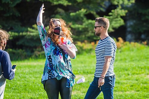 MIKAELA MACKENZIE / WINNIPEG FREE PRESS

A masked individual throws dildos at an organizer at an anti-mask rally at The Forks in Winnipeg on Friday, May 28, 2021. For Temur story.
Winnipeg Free Press 2020.