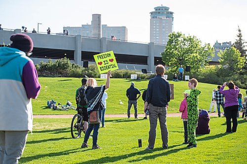 MIKE SUDOMA / WINNIPEG FREE PRESS  
A protestor hold up a sign saying Freedom is Essential during an anti mask event at The Forks Friday
May 28, 2021