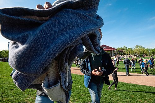 MIKE SUDOMA / WINNIPEG FREE PRESS
An Anti-Mask protester cover up a camera lens during a rally at the Forks Friday evening after mainstream media was called out by one of the speakers at the event
May 28, 2021