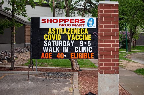 Daniel Crump / Winnipeg Free Press. A sign outside the Osborne Shoppers Drug Mart location informs people that  AstraZeneca vaccines are available at this location. Second doses are now available for people age 40 and up. May 29, 2021.