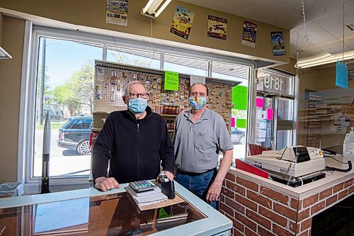 MIKE SUDOMA / WINNIPEG FREE PRESS
Cellar Dweller Owner, Gerry Fingler (left) and long time sales staff, Jim Holland (right) stand behind the sales counter for one of the last times before Cellar Dwellers official closing day Saturday
May 28, 2021
