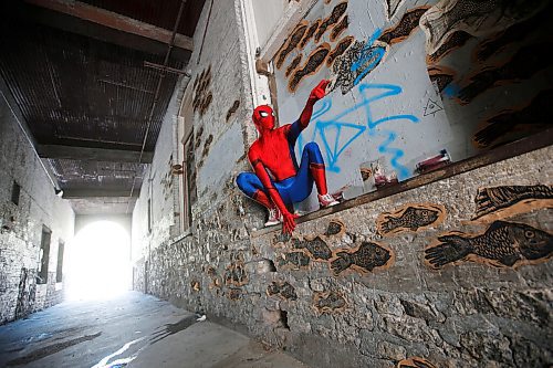 JOHN WOODS / WINNIPEG FREE PRESS
Winnipegs Spider-Man is photographed in the Exchange District in Winnipeg Monday, May 31, 2021. Spider-Man conducts neighbourhood patrols on his bicycle.

Reporter: Sanderson