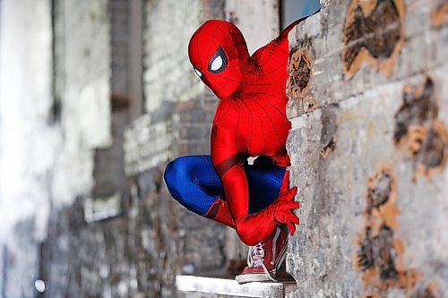 JOHN WOODS / WINNIPEG FREE PRESS
Winnipegs Spider-Man is photographed in the Exchange District in Winnipeg Monday, May 31, 2021. Spider-Man conducts neighbourhood patrols on his bicycle.

Reporter: Sanderson